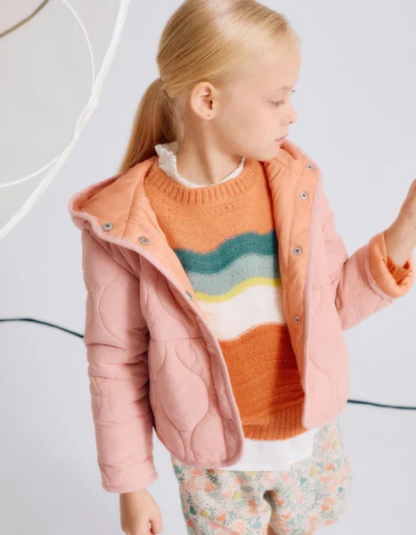 Jersey niña naranja con rayas onduladas